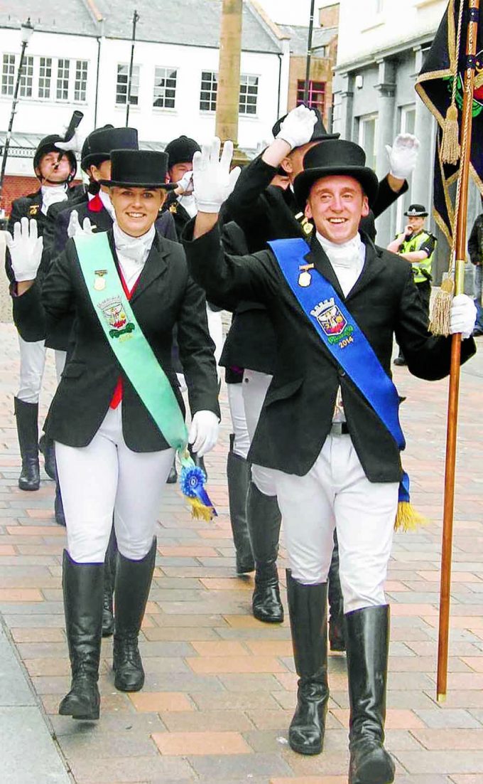 RETURNING . . . 2014 Cornet Chris Beattie and Cornet's Lass Ashley Higgins arrive at the ceremony