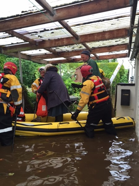 Residents rescued from flooded home