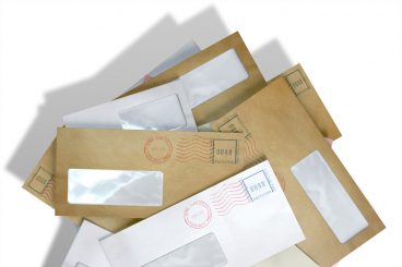 Postman fired as hidden letters found