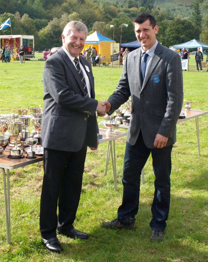 Chairman Gordon Reid, right, thanks Robin Coates, who presented this year's prizes. Mr Coates, of Waterbeck, has been on the committee for over 40 years and is a past chairman