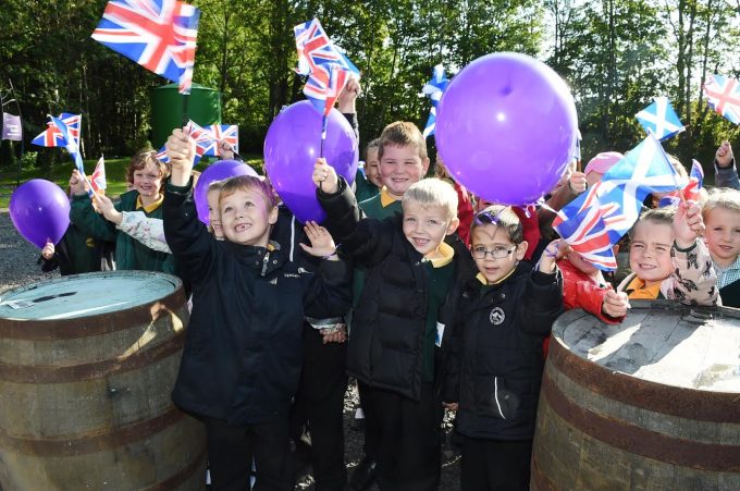 ROYAL WAVE . . . children from Elmvale Primary