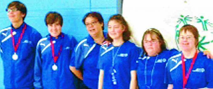 PRIZE-WINNERS . . . members of the boccia team show off their medals