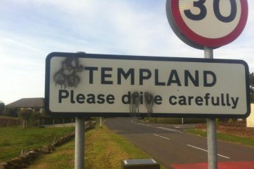 Vandals target village road signs