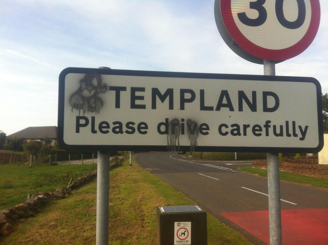 Vandals target village road signs