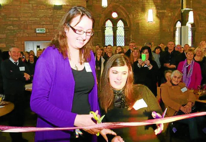 Amy Wright and Amy Duffy cutting the ribbon