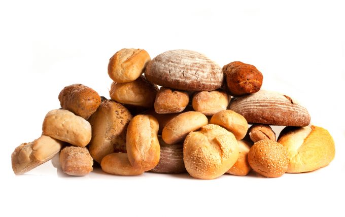 assortment of baked bread isolated on white background