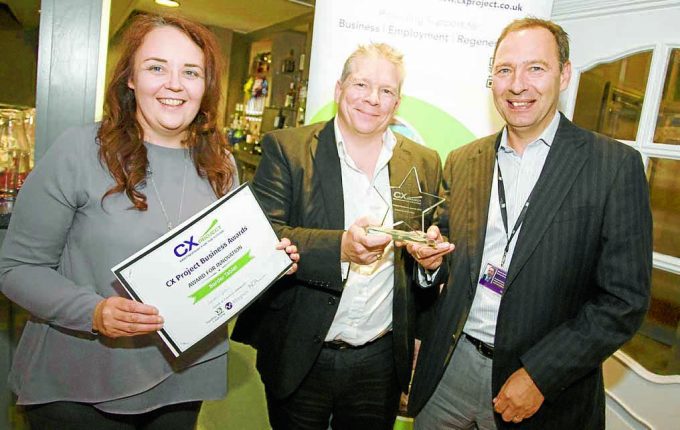 Michael and Susan Robertson, Border Tablet presented with Award for Innovation by David Gardiner of Business Gateway