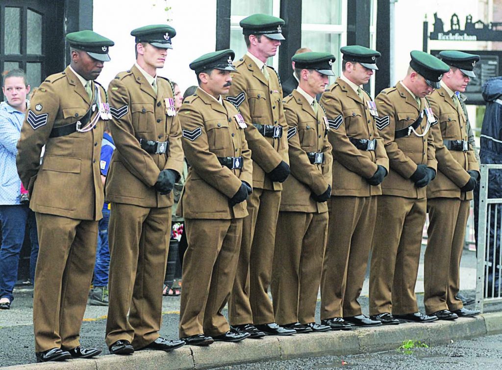 PAYING RESPECTS . . . fellow NCOs from The Rifles regiment joined the public lining the High Street at Ecclefechan as Corporal Josh Hoole's cortege passed by *** Local Caption *** PAYING RESPECTS . . . fellow NCOs from The Rifles regiment joined the public lining the High Street at Ecclefechan as Corporal Josh Hoole's cortege passed by