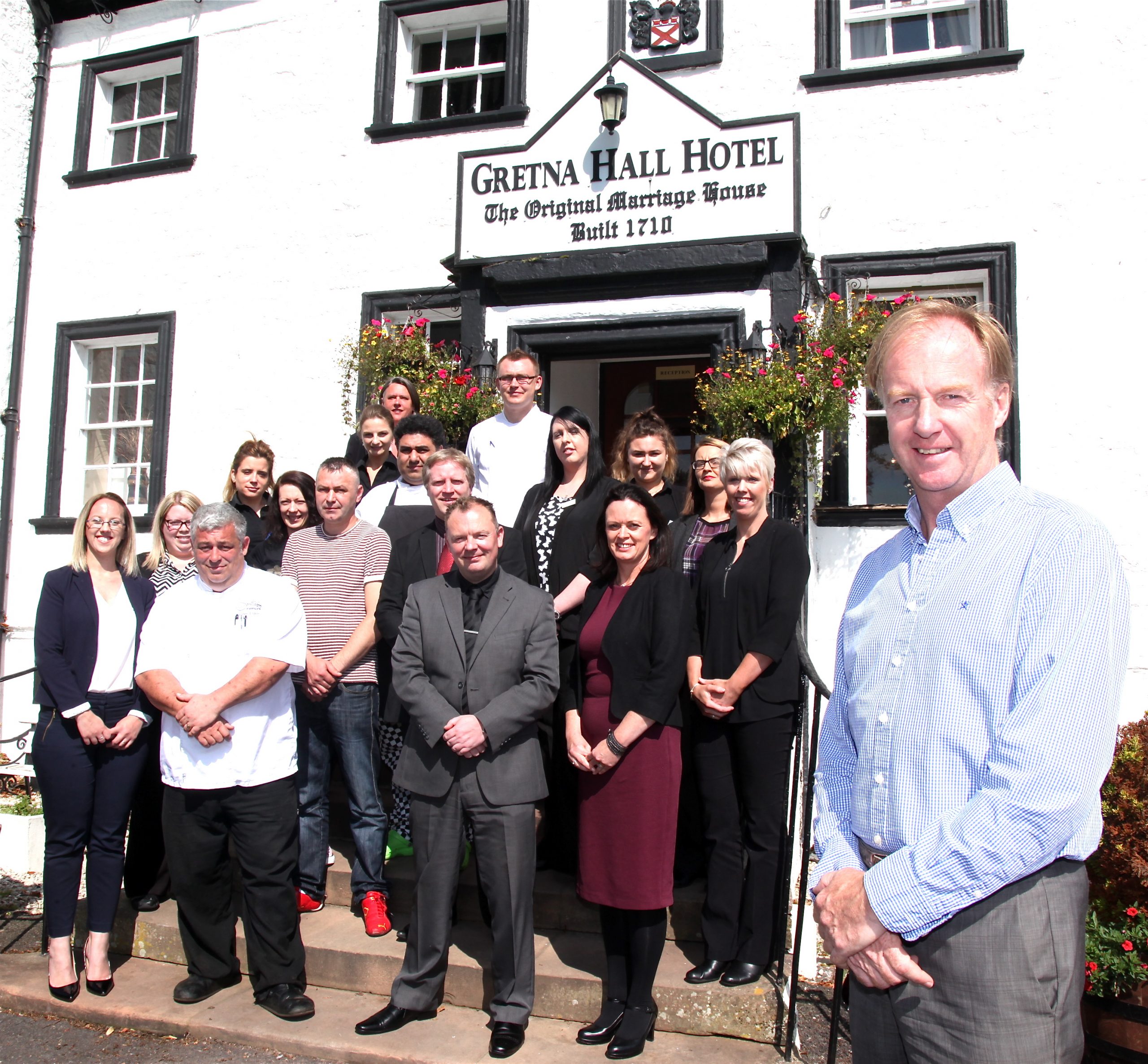 Family tourism firm buy historic hotel