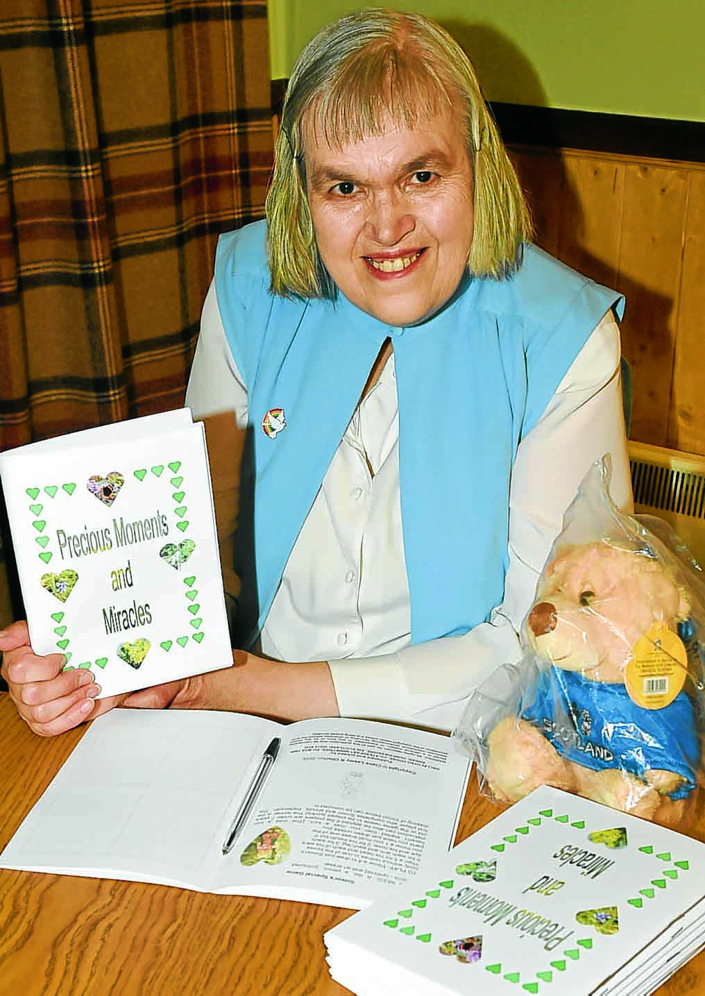 Claire's book raises funds for charities