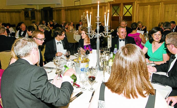 TABLE TALK . . . the evening was in full swing. Picture by GE Photography