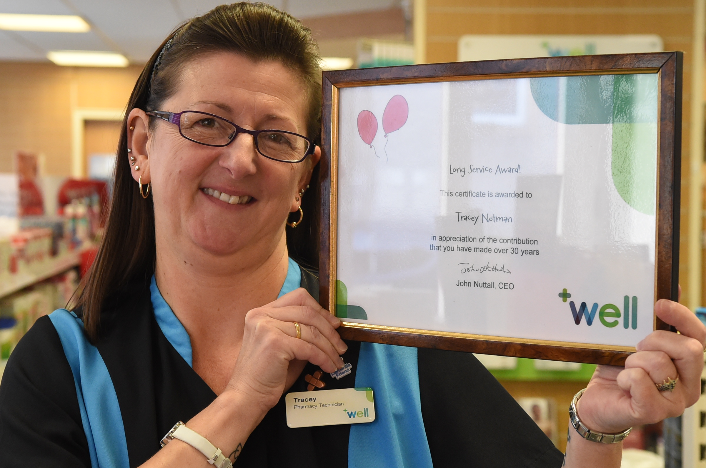 Tracey honoured for service with a smile