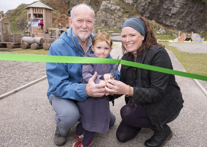 RIBBON CUTTING . . . the official opening was carried out by Euan's family