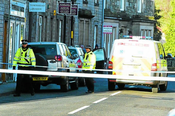 Police in Langholm following last week's raid