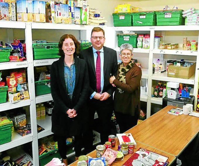 CHALLENGING TIMES . . . the Trussell Trust food bank based at the charity Apex was where Colin Smyth spoke with workers about how the food is distributed as well as the challenges the charity is facing.