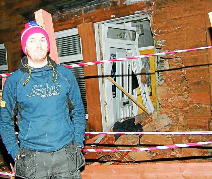 TAPED OFF . . . Fraser McGarva returned home to find his home badly damaged