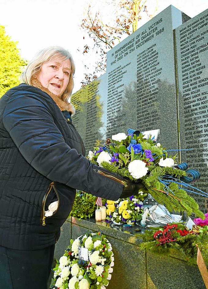 RESPECT . . . Doreen Jenkins, of Lockerbie Community Council, lays a wreath on behalf of the town