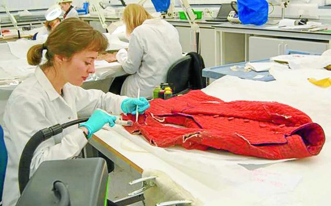 Hannah at work on the jacket preservation