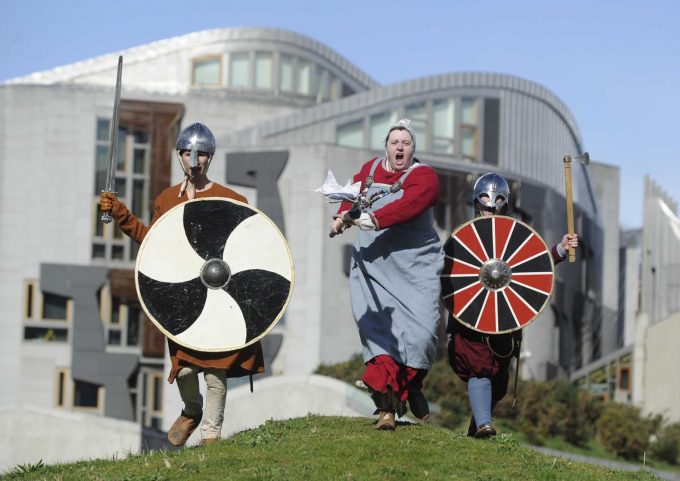 FREE PICTURE: Vikings Invade Edinburgh with Petition to Save Galloway Hoard, Tue 21/03/2017:Thousands call on Culture Secretary to help ensure treasures have their home in Kirkcudbright – near to where they were buried 1,000 years ago.Vikings joined campaigners at the Scottish Parliament to call for 1,000-year-old treasures to be returned to Galloway where they were found and not kept in Edinburgh by the National Museums. A petition, handed in at the Scottish Parliament, has attracted more than 5,000 signatures and calls on Culture Secretary Fiona Hyslop MSP to help ensure the hoard returns home to Galloway. Pictured are vikings from the Regia Anglorum (correct) historical re-enactment group Connor Milton (left), Louisa Sanderson (right) and Jen Cresswell (cdntre). www.vikinggallowayhoard.comMore information from: Matthew Shelley, PR consultant for - 07786 704 299 or Matthew@ScottishFestivalsPR.Org Photography for Galloway Viking Hoard (GVH) from: Colin Hattersley Photography - www.colinhattersley.com - colinhattersley@btinternet.com - 07974 957 388.Free FIRST USE (ONLY) picture.Photography from: Colin Hattersley Photography - colinhattersley@btinternet.com - www.colinhattersley.com - 07974 957 388