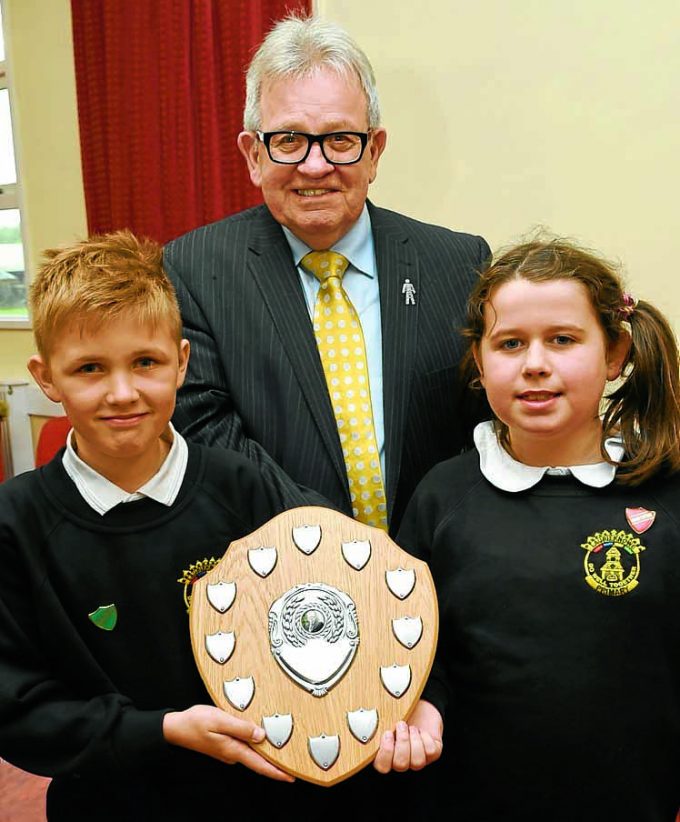 civic pride rt *** Local Caption *** ENDEAVOUR AWARD . . . Jack Groom presents the trophy to Euan and Evie representing Laurieknowe Primary School