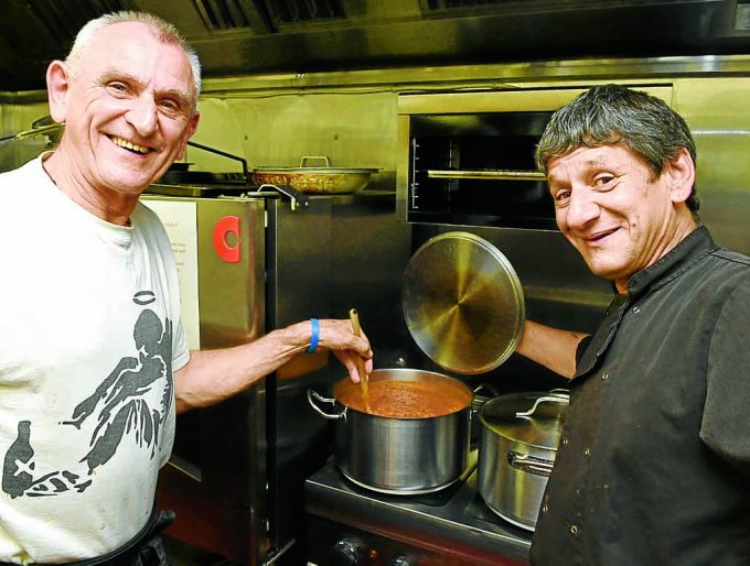 DELICIOUS . . . keeping the riders well fed were Will Whyte, left and Nigel Hassan