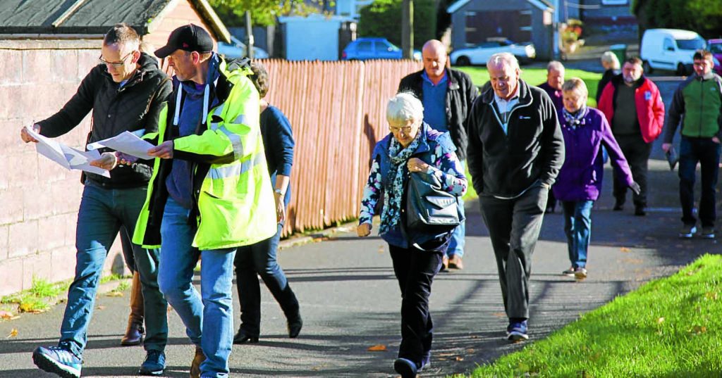 FLOOD FACT-FINDING  . . . senior council officials met residents from the worst affected areas during last summer's flooding in Annan at a consultation tour on Sunday  *** Local Caption *** FLOOD FACT-FINDING  . . . senior council officials met residents from the worst affected areas during last summer's flooding in Annan at a consultation tour on Sunday