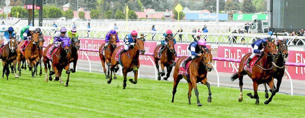 NAKEETA Ridden by Glyn Schofield (purple hood 18) and Trained by Iain Jardine 5th in the Emirates Melbourne Cup at Flemington 7/11/17Photograph by Grossick Racing Photography 0771 046 1723