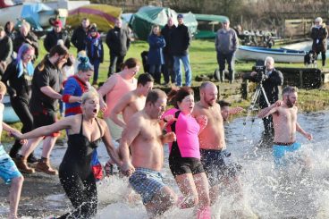 Plucky swimmers welcome 2018 with charity loch dip