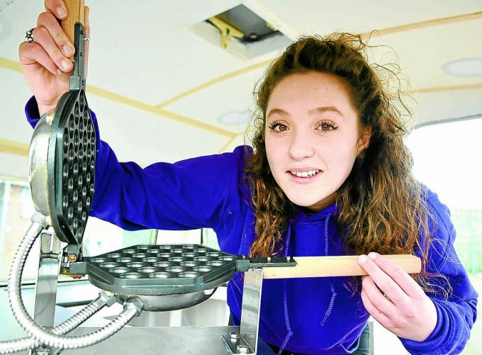 HOT STUFF . . . Megan Birley shows off her unique bubble waffle iron  *** Local Caption *** HOT STUFF . . . Megan Birley shows off her unique bubble waffle iron