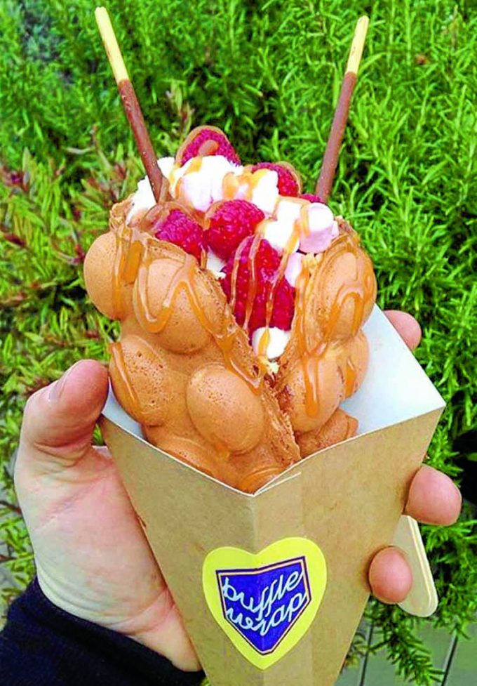 YUM . . . a bubble waffle by Buffle Wrap *** Local Caption *** YUM . . . a bubble waffle by Buffle Wrap