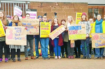 Students rally to support staff