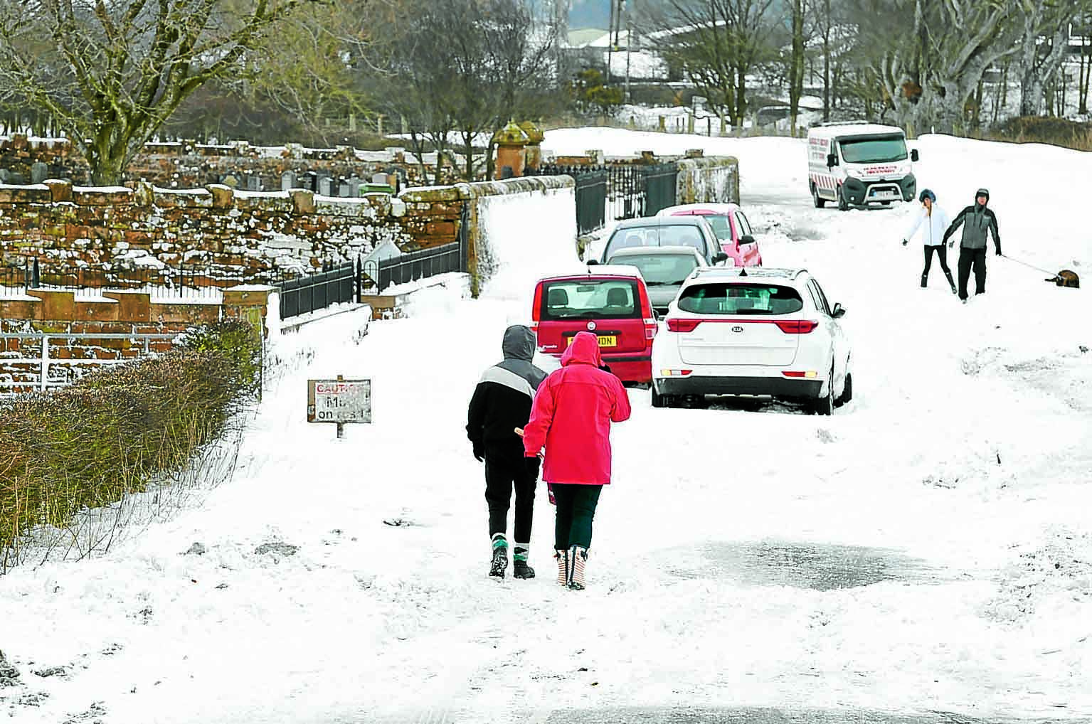 Village snow storm cars abandoned