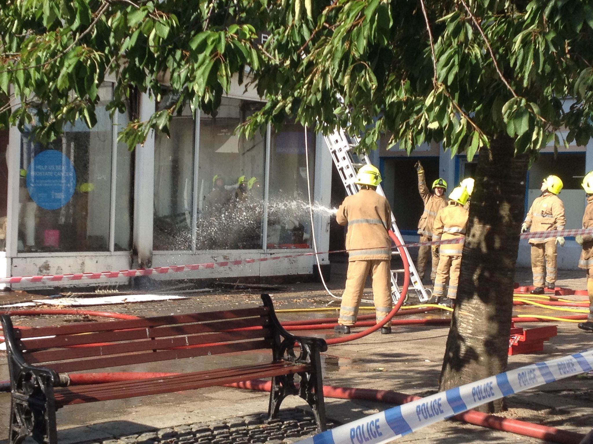 Firefighters tackle high street fire