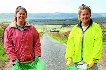 Sisters take on rubbish task