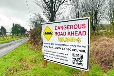 Fun sign’s a winner in road repair fight