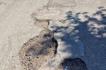 Towns despair over pothole plague