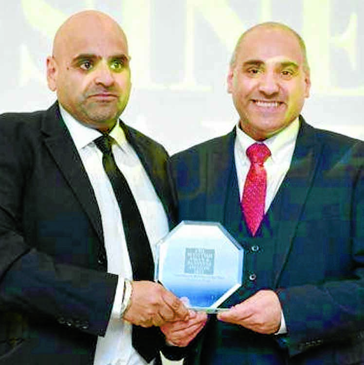 Award joy for shop family