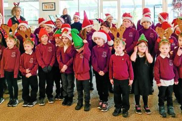 Springfield students sing for shoppers