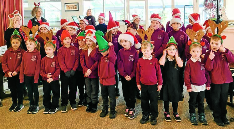 Springfield students sing for shoppers