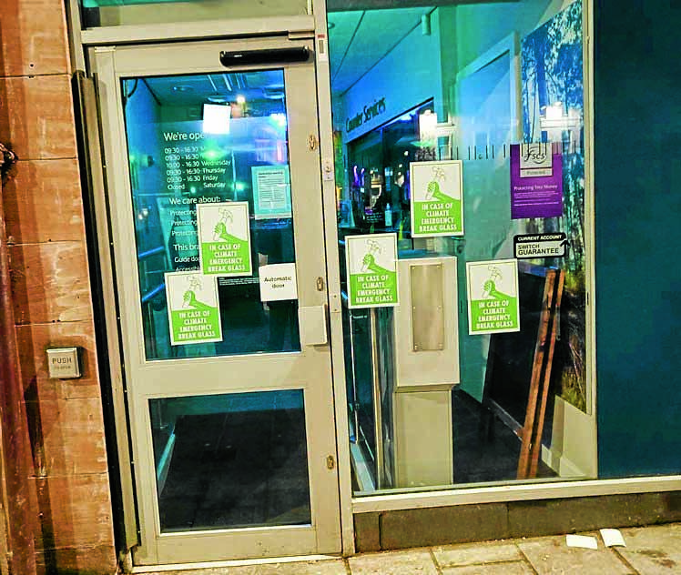 Climate activists strike at bank branch