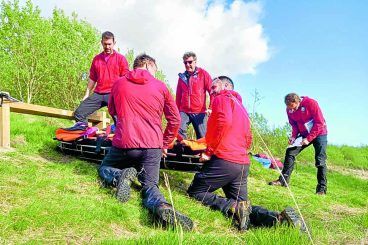 Team rush to aid of injured walker