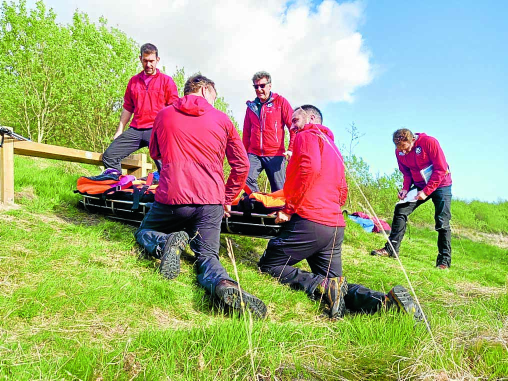 Team rush to aid of injured walker