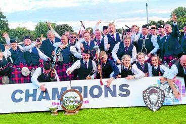 Town’s pipers on top of the world