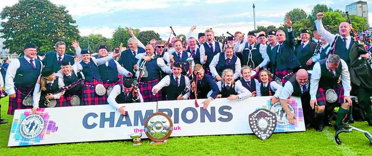 Town’s pipers on top of the world