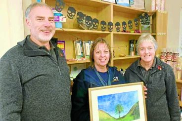 Helen presents iconic tree painting