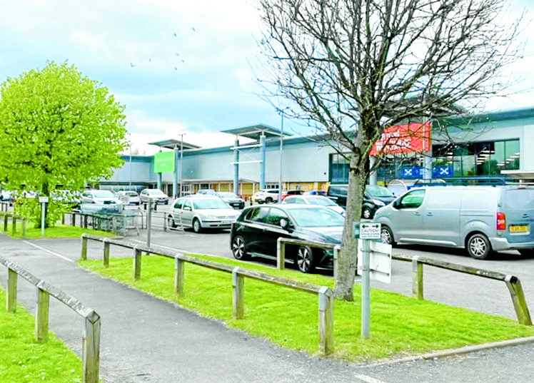 Next win eight year fight to get out of town store